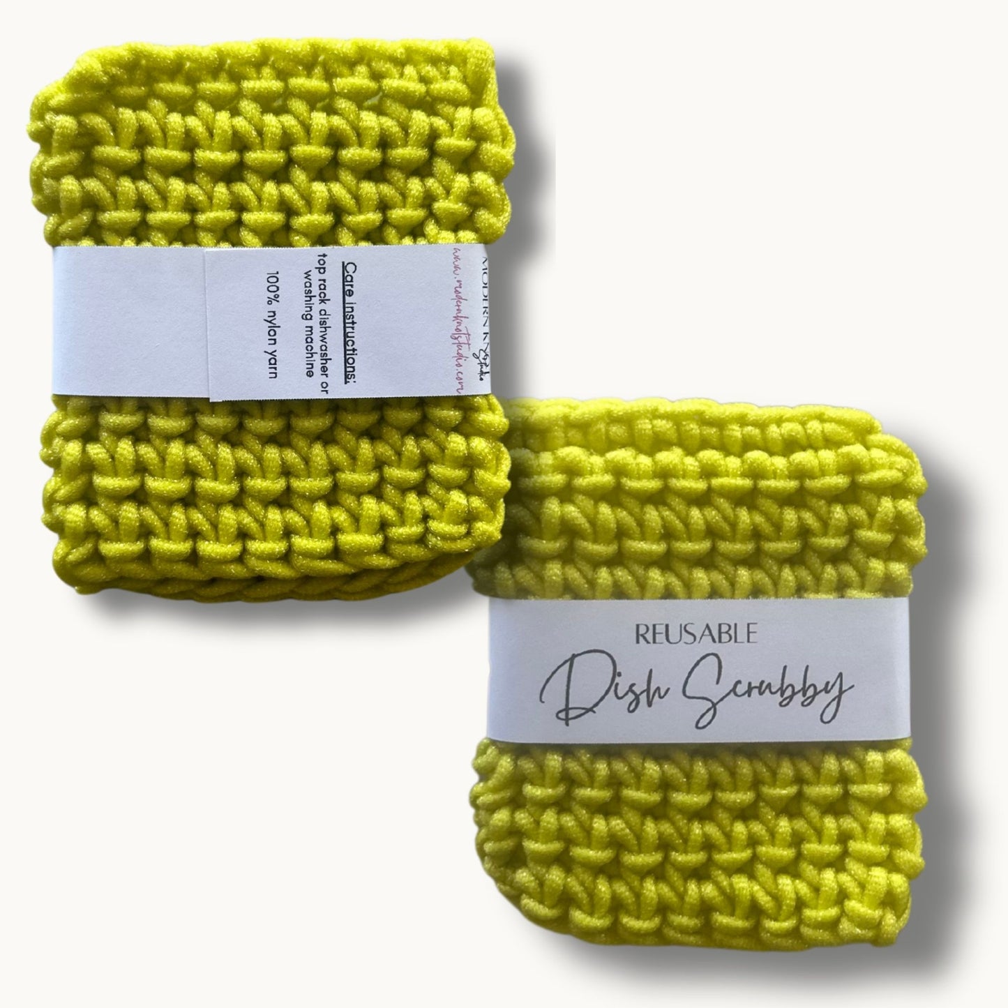 Two lime crochet dish scrubbies with labels, one labeled 'REUSABLE DISH SCRUBBY' and the other with a care instruction label.